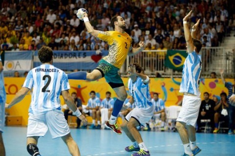 TORONTO, ON - JULY 25: Henrique Texeira of Brazil goes up for a shot against Argentina during the men's handball final on Day 15 of the Toronto 2015 Pan Am Games on July 25, 2015 in Toronto, Canada.   Ezra Shaw/Getty Images/AFP